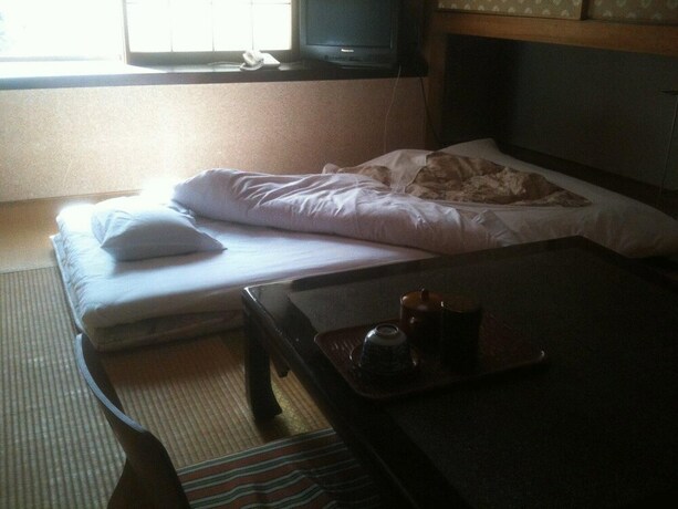 Imagen de la habitación del Ryokan Kamesei. Foto 25