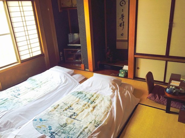 Imagen de la habitación del Ryokan Kaminaka. Foto 13