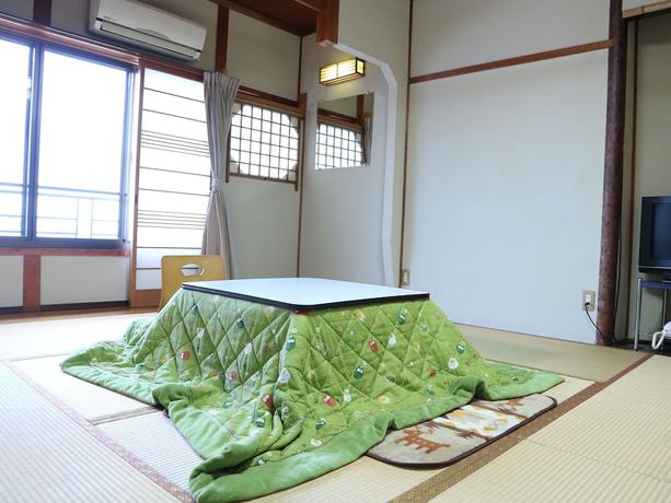 Imagen de la habitación del Ryokan Kanko Yamato. Foto 11