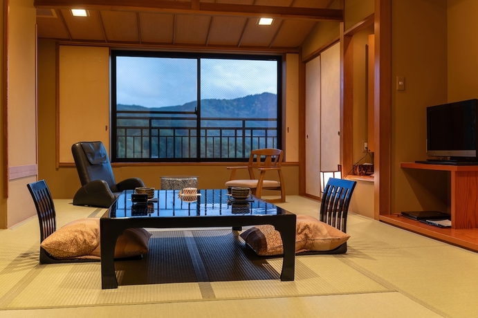 Imagen de la habitación del Ryokan Kashintei Shirahama. Foto 11