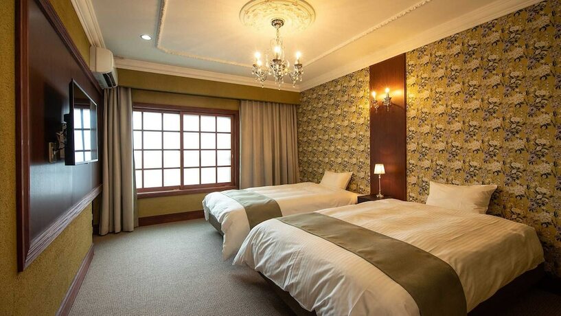 Imagen de la habitación del Ryokan Kiraku. Foto 21