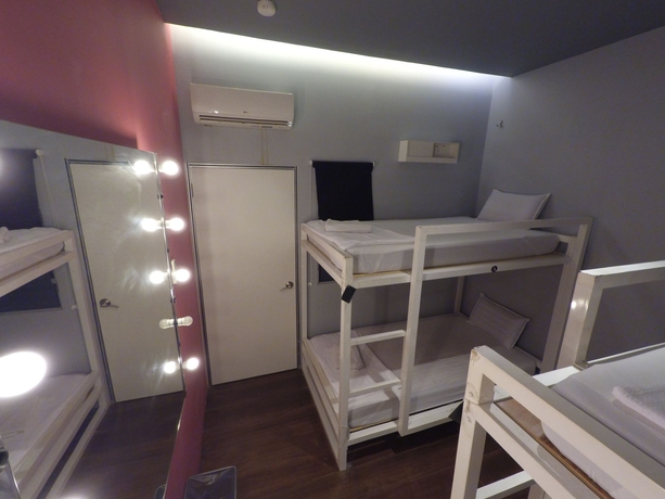Imagen de la habitación del Ryokan Muntri Boutique Hostel. Foto 4