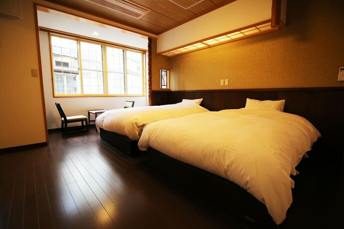 Imagen de la habitación del Ryokan Nakajimaya. Foto 22