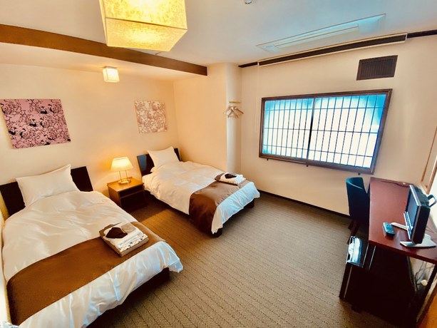 Imagen de la habitación del Ryokan Nishiyama - Established In 1953. Foto 6