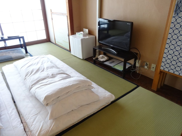 Imagen de la habitación del Ryokan Nogamihonkan. Foto 3