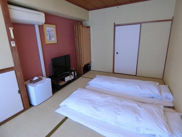 Imagen de la habitación del Ryokan Nogamihonkan. Foto 8
