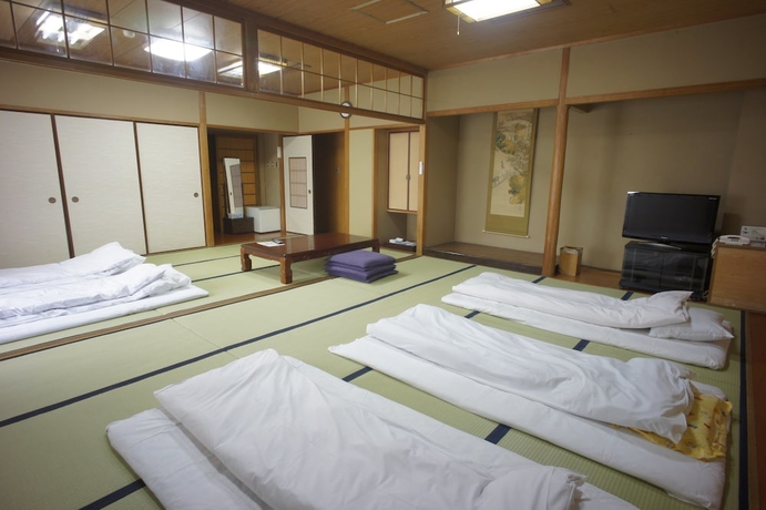 Imagen de la habitación del Ryokan Nogamihonkan. Foto 9