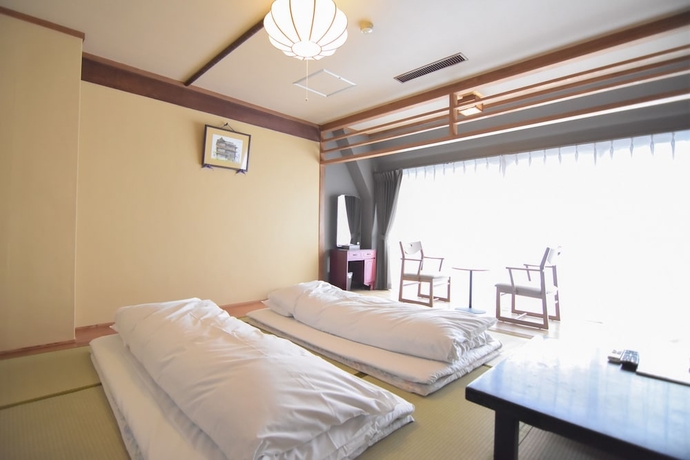 Imagen de la habitación del Ryokan Nogamihonkan. Foto 12