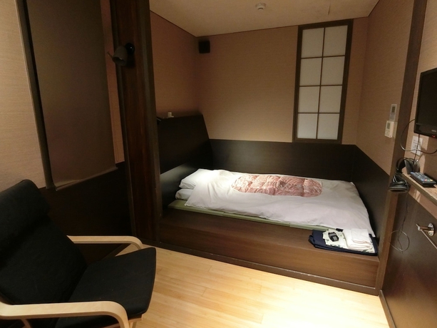Imagen de la habitación del Ryokan Nogamihonkan. Foto 15