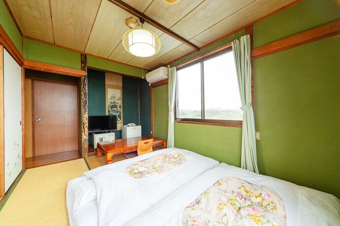 Imagen de la habitación del Ryokan OYO Chikazaki Bekkan Genkai. Foto 10