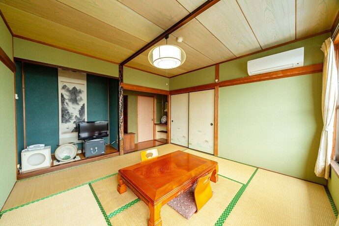 Imagen de la habitación del Ryokan OYO Chikazaki Bekkan Genkai. Foto 11
