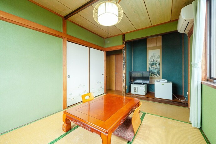 Imagen de la habitación del Ryokan OYO Chikazaki Bekkan Genkai. Foto 13