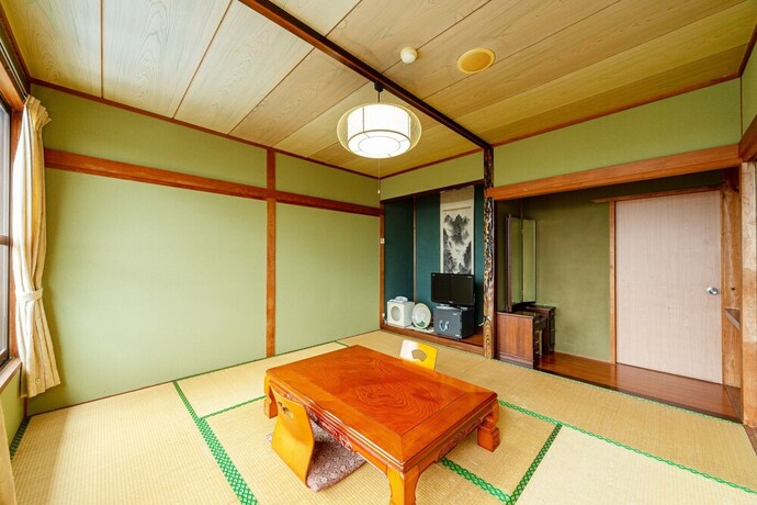 Imagen de la habitación del Ryokan OYO Chikazaki Bekkan Genkai. Foto 15
