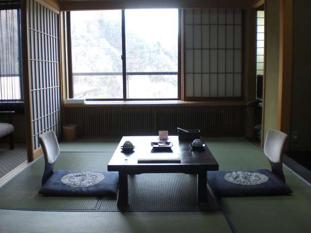 Imagen de la habitación del Ryokan Okada Warakutei. Foto 6
