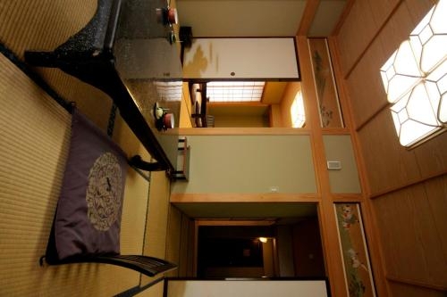 Imagen de la habitación del Ryokan Oumeitei Tsuji. Foto 6