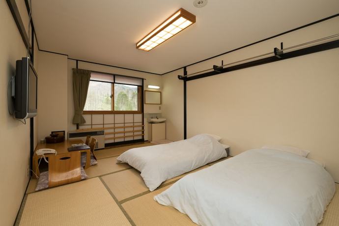 Imagen de la habitación del Ryokan Sachinoyu Hotel Shiga Kogen. Foto 7