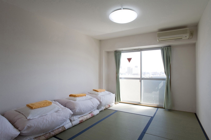 Imagen de la habitación del Ryokan Tabist Sparkling Dolphins Inn Kyoto. Foto 11