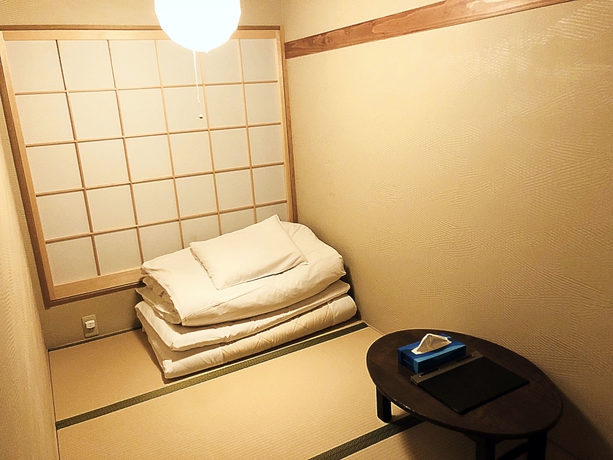 Imagen de la habitación del Ryokan Tadaima Japan Shinjuku. Foto 15