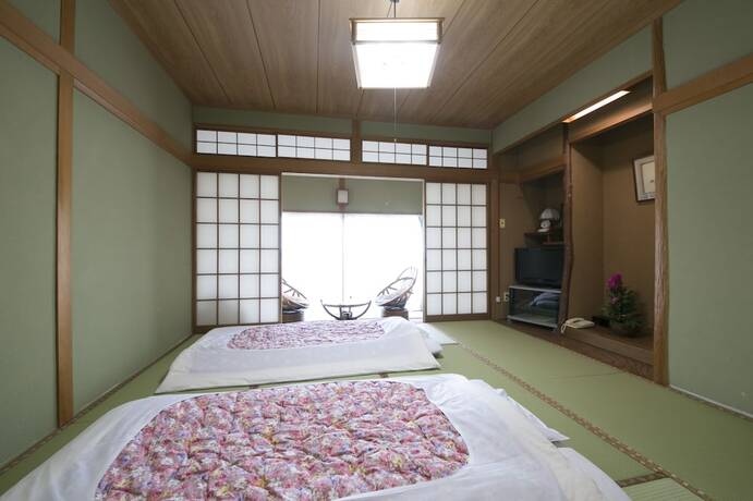 Imagen de la habitación del Ryokan Tamagawa. Foto 21