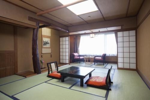 Imagen de la habitación del Ryokan Tatsuta. Foto 8