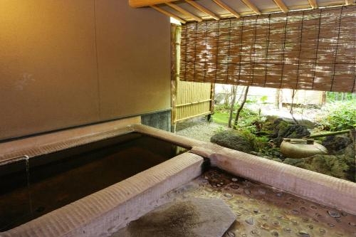 Imagen de la habitación del Ryokan Yufuin Onsen Hinoharu. Foto 9