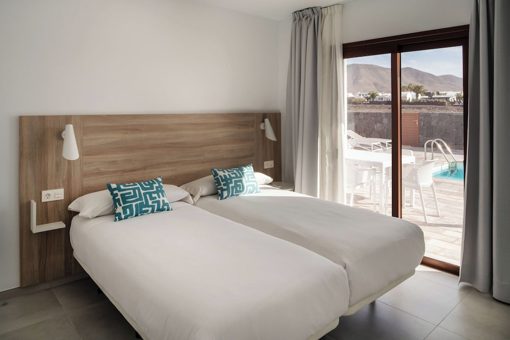 Imagen de la habitación del Villa Ereza Villas La Granja. Foto 4