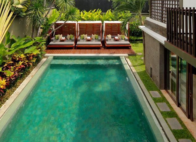 Imagen de la piscina del Villa Seminyak Icon By Karaniya Experience. Foto 19