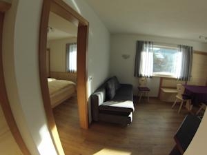 Imagen de la habitación del Villa Villa Hubertus Apartments. Foto 3