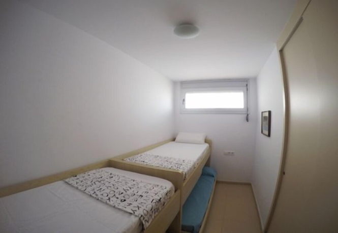 Imagen de la habitación del Viviendas Turísticas Vacacionales Aiguaneu Apartaments Center. Foto 13