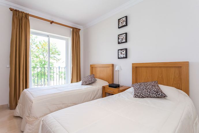 Imagen de la habitación del Viviendas Turísticas Vacacionales Arcos Gardens Sol Rent Golf. Foto 9