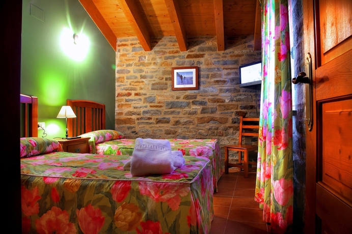 Imagen de la habitación del Viviendas Turísticas Vacacionales Casa Pirineo, Ainsa. Foto 6