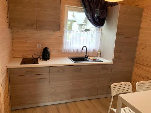 Imagen de la habitación del Viviendas Turísticas Vacacionales Dom Gościnny and Domki Letniskowe EDYTA. Foto 2