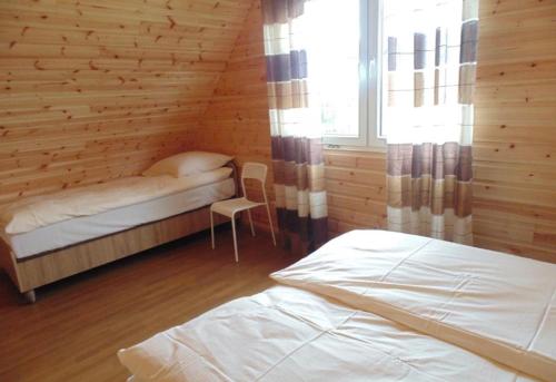 Imagen de la habitación del Viviendas Turísticas Vacacionales Dom Gościnny and Domki Letniskowe EDYTA. Foto 6