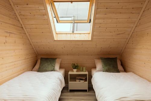 Imagen de la habitación del Viviendas Turísticas Vacacionales Domki Sarbinowo Elizjum. Foto 2