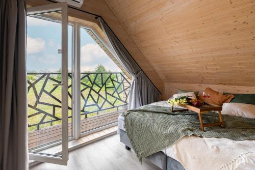 Imagen de la habitación del Viviendas Turísticas Vacacionales Domki Sarbinowo Elizjum. Foto 4