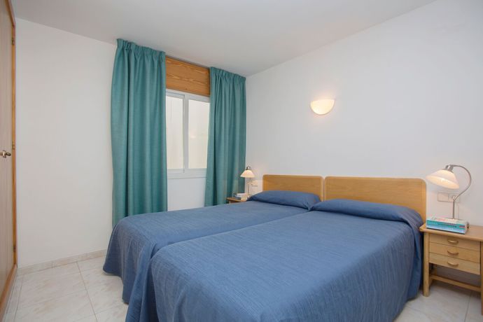 Imagen de la habitación del Viviendas Turísticas Vacacionales Edificio Puerto. Foto 15