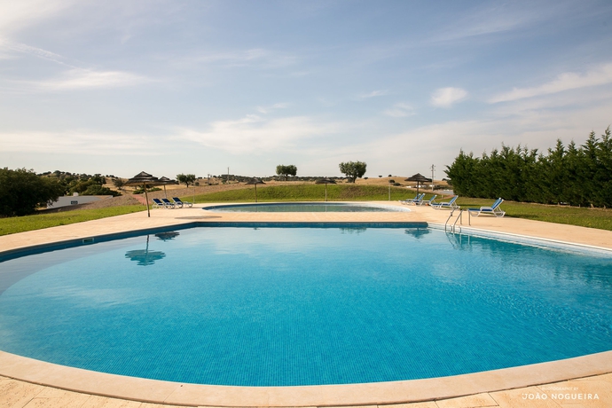 Imagen de la piscina del Viviendas Turísticas Vacacionales Herdade Do Gizo. Foto 3
