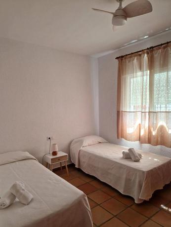Imagen de la habitación del Viviendas Turísticas Vacacionales Las Casas de Las Flores. Foto 4