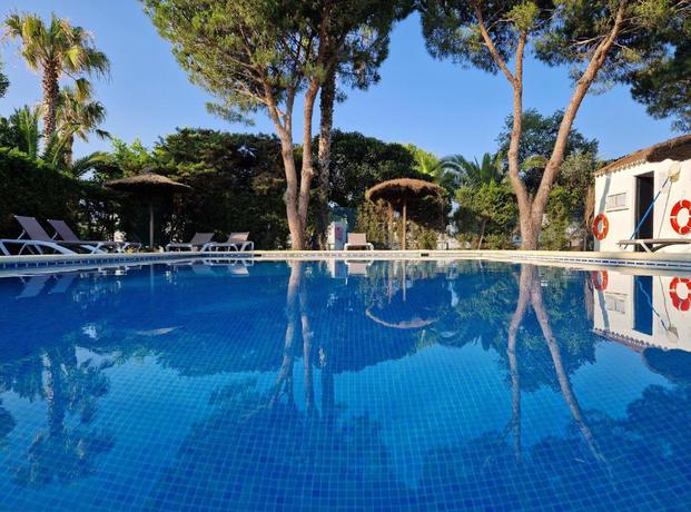 Imagen de la piscina del Viviendas Turísticas Vacacionales Las Casas de Las Flores. Foto 8
