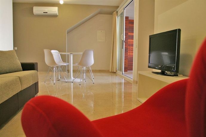 Imagen de los interiores del Viviendas Turísticas Vacacionales L'escala Resort. Foto 8