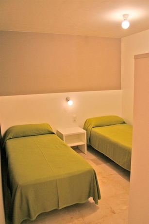 Imagen de la habitación del Viviendas Turísticas Vacacionales L'escala Resort. Foto 4