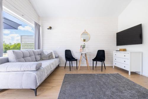 Imagen de la habitación del Viviendas Turísticas Vacacionales Lumi Resort Domki letniskowe z podgrzewanym basenem. Foto 4