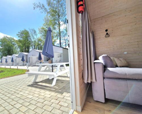 Imagen de los interiores del Viviendas Turísticas Vacacionales Lumi Resort Domki letniskowe z podgrzewanym basenem. Foto 8