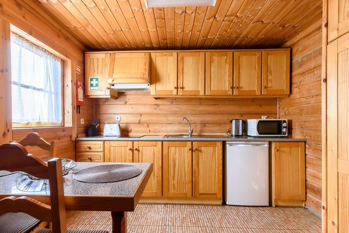 Imagen de la habitación del Viviendas Turísticas Vacacionales Luna Chalets Da Montanha. Foto 8