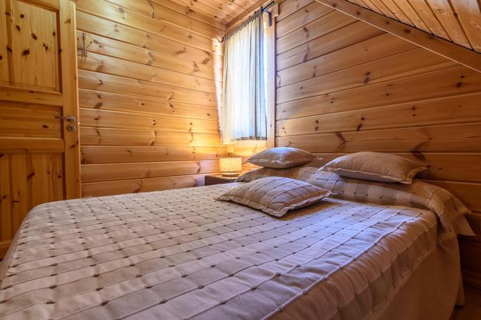 Imagen de la habitación del Viviendas Turísticas Vacacionales Luna Chalets Da Montanha. Foto 9
