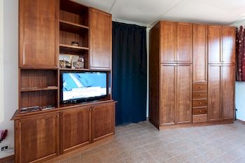 Imagen de la habitación del Viviendas Turísticas Vacacionales Mons Aureus Resort. Foto 9