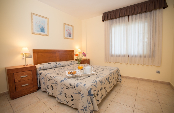 Imagen de la habitación del Viviendas Turísticas Vacacionales Ona Jardines Paraisol. Foto 5