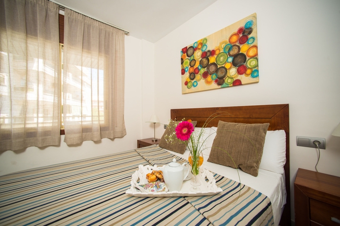 Imagen de la habitación del Viviendas Turísticas Vacacionales Ona Jardines Paraisol. Foto 11