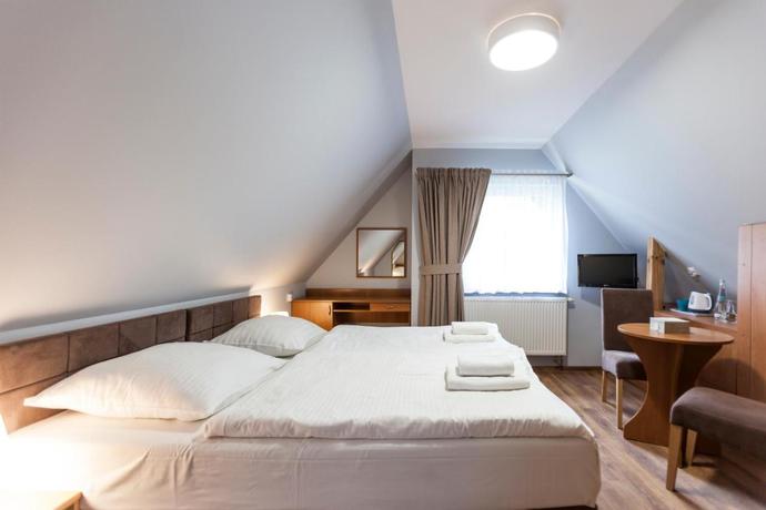 Imagen de la habitación del Viviendas Turísticas Vacacionales Ośrodek Angela. Foto 3