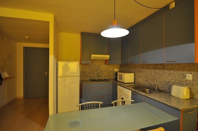 Imagen de la habitación del Viviendas Turísticas Vacacionales Port Canigo. Foto 6